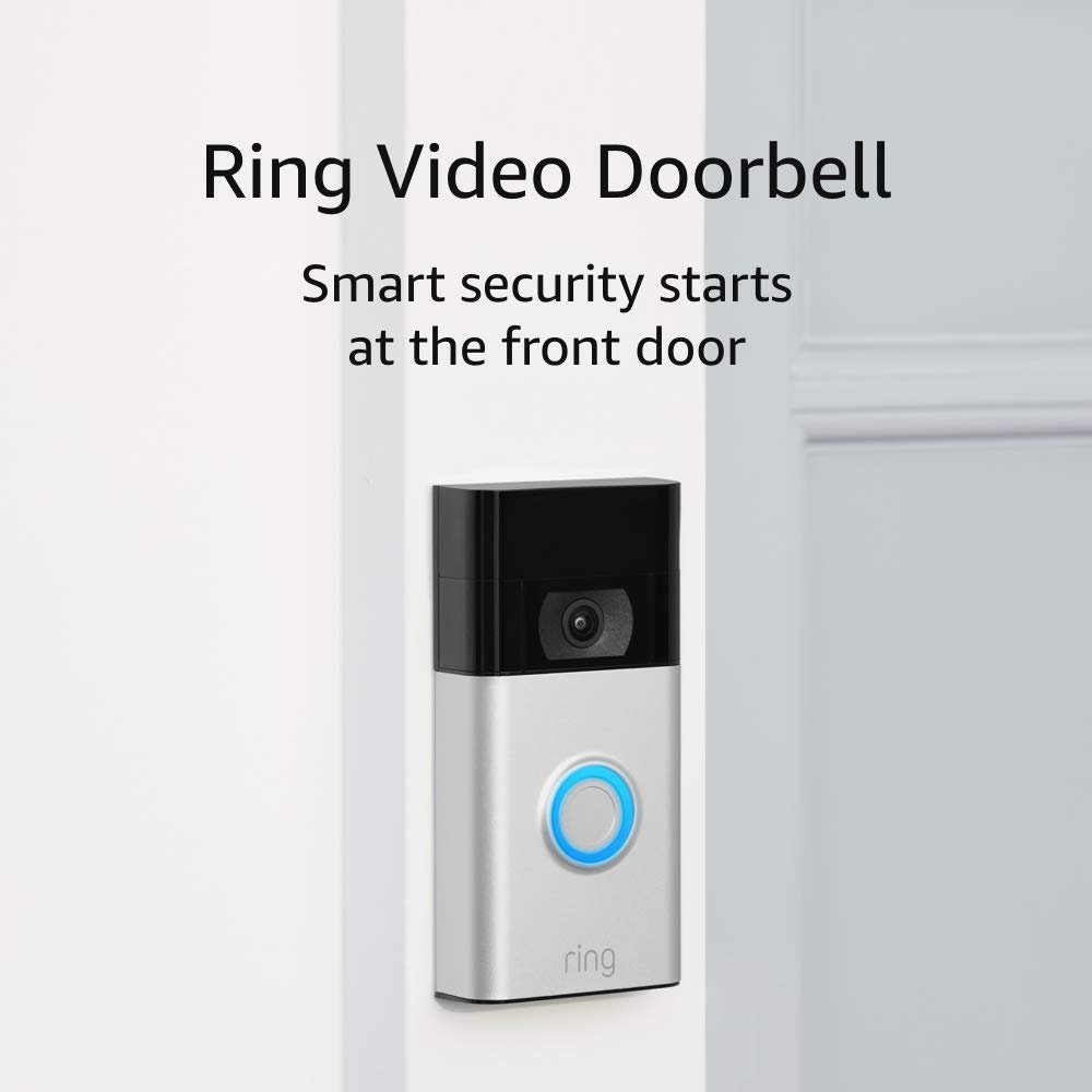 Ring Video Doorbell mounted on a white wall with a blue light