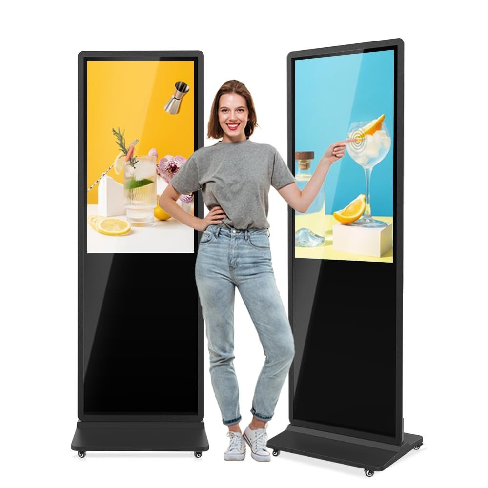 Woman standing between two digital display screens with cocktail images