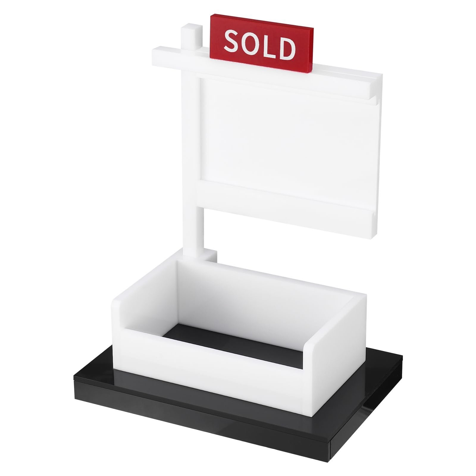 White and red "SOLD" sign on a black base