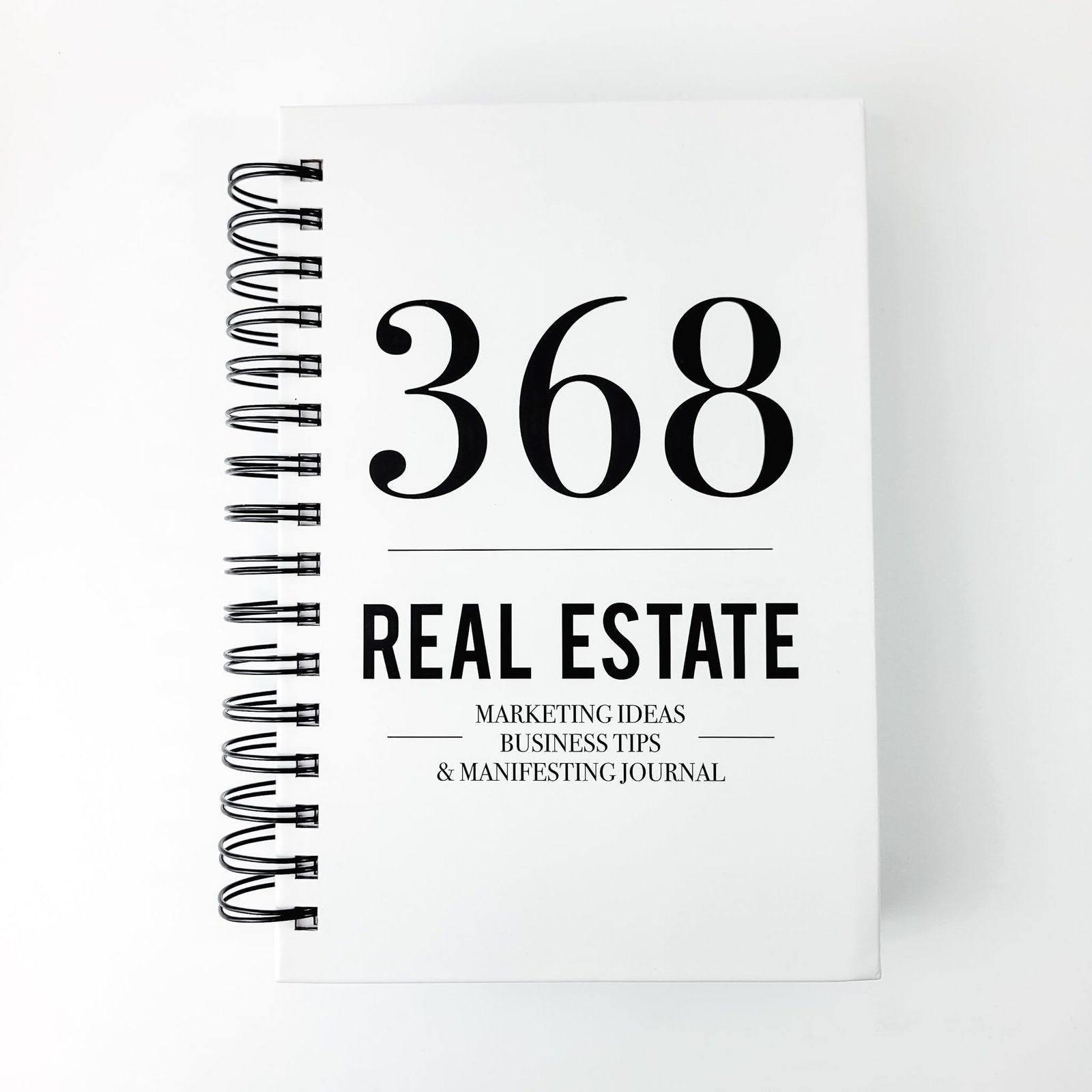 White spiral notebook with "368 REAL ESTATE" and marketing tips