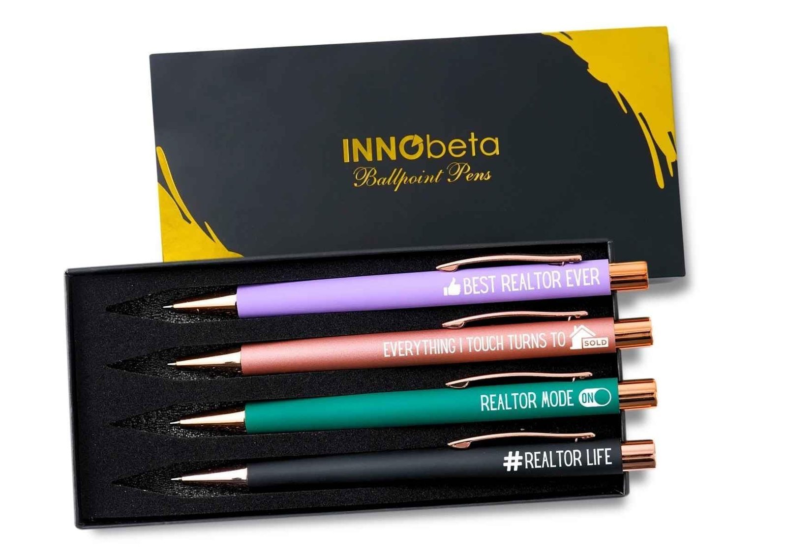 Set of four realtor-themed pens in a gift box. Each pen has a different phrase